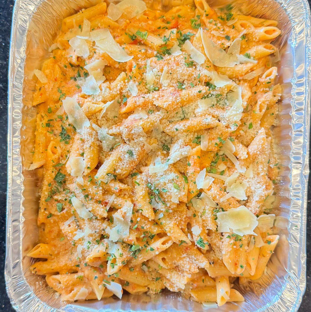 HALF TRAY PENNE ALLA VODKA.
