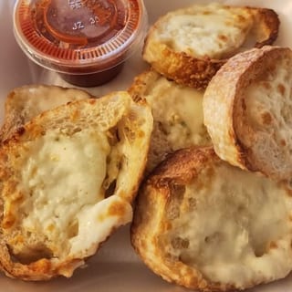 HALF TRAY GARLIC CHEESE BREAD